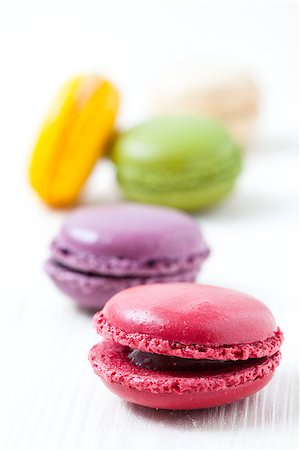 pink macaroon - Close-up of colorful macaroons on light background Stock Photo - Budget Royalty-Free & Subscription, Code: 400-06556499