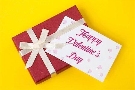 gift box and Valentines day card on yellow background Stock Photo - Budget Royalty-Free & Subscription, Code: 400-06556795