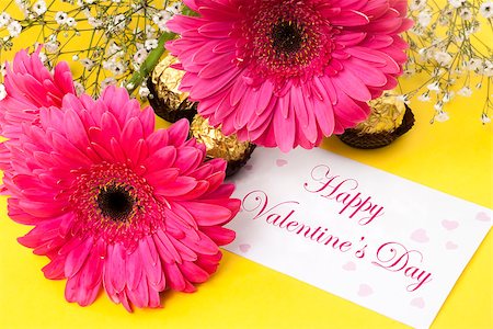 Gerbera daisies and Valentines day card on yellow background Stock Photo - Budget Royalty-Free & Subscription, Code: 400-06556796