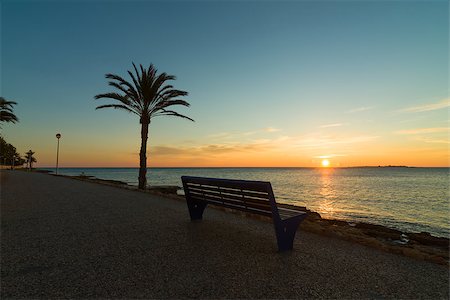 simsearch:400-06083036,k - Sunrise on the calm scenics of a Mediterranean beach promenade Stock Photo - Budget Royalty-Free & Subscription, Code: 400-06556979