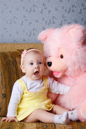 small girl with big toy bear Stock Photo - Budget Royalty-Free & Subscription, Code: 400-06557060