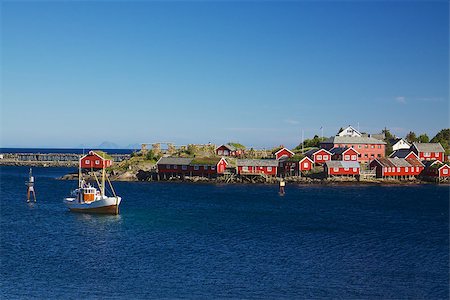 simsearch:400-06557083,k - Red fishing rorbu huts and fishing boat in town of Reine on Lofoten islands Stockbilder - Microstock & Abonnement, Bildnummer: 400-06557082