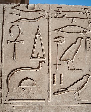 simsearch:400-04782815,k - Ancient Egyptian hieroglyphic carvings on a temple wall at Karnak in Luxor Foto de stock - Super Valor sin royalties y Suscripción, Código: 400-06558068