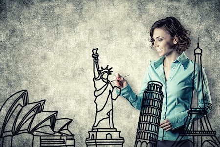 statue of liberty silhouette - Photo of the smiling girl drawing different sights Stock Photo - Budget Royalty-Free & Subscription, Code: 400-06558095