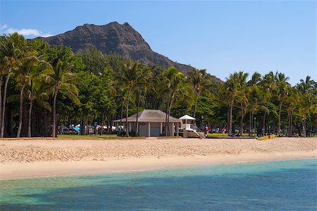 A relaxing scene of Waikiki beach with Diamond Head in the background. Stock Photo - Budget Royalty-Free & Subscription, Code: 400-06558129