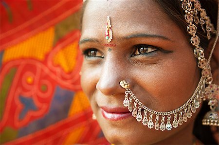 pictures of beautiful girls indian local - Close up face of Traditional Indian woman in sari costume, India Stock Photo - Budget Royalty-Free & Subscription, Code: 400-06558385