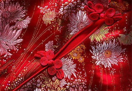 simsearch:400-05132616,k - Traditional Chinese Red knot buttons on Cheongsam silk dress details Stock Photo - Budget Royalty-Free & Subscription, Code: 400-06558419