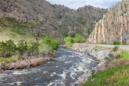 Cache la Poudre RIver and highway in canyon west of Fort Collins, Colorado, springtime flow Stock Photo - Budget Royalty-Free & Subscription, Code: 400-06558599