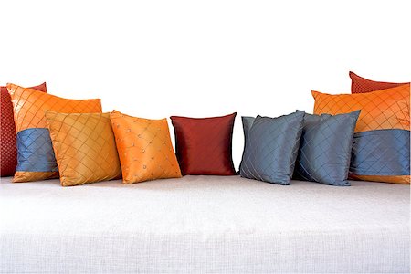 red cushion on a sofa - The colorful pillows scattered on the table. Stock Photo - Budget Royalty-Free & Subscription, Code: 400-06558730