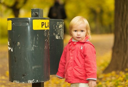Portrait of baby near trash can Stock Photo - Budget Royalty-Free & Subscription, Code: 400-06559052