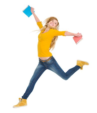 Happy student girl with books jumping Stock Photo - Budget Royalty-Free & Subscription, Code: 400-06559111