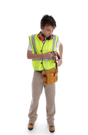 students working with tools - Trainee apprentice builder carpenter handyman construction worker or similar profession Stock Photo - Budget Royalty-Free & Subscription, Code: 400-06559174