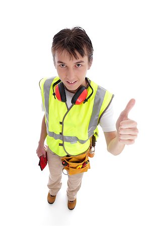 students working with tools - A positive teen trainee apprentice builder, carpenter, construction worker smiling and showing a thumbs up hand sign.  White background. Stock Photo - Budget Royalty-Free & Subscription, Code: 400-06559175