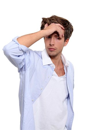 Man with a headache Stock Photo - Budget Royalty-Free & Subscription, Code: 400-06559656