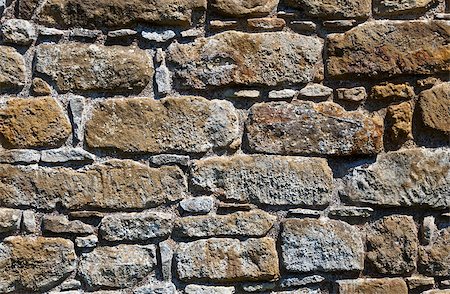 simsearch:400-04488128,k - Rough, highly textured old stone block wall Foto de stock - Super Valor sin royalties y Suscripción, Código: 400-06559727