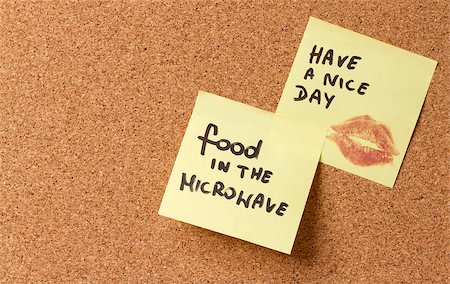 post it note on notice board picture - Yellow sticky note/post  Have a nice day. kiss food in the microwave. On a coarkboard. Stock Photo - Budget Royalty-Free & Subscription, Code: 400-06564840