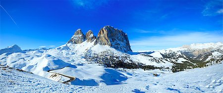 sky view mountain road winter - Beautiful winter mountain landscape with road (Sella Pass , Italy). Stock Photo - Budget Royalty-Free & Subscription, Code: 400-06564961