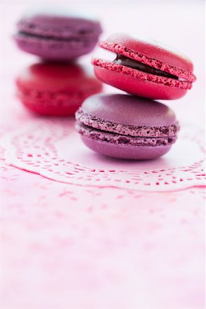simsearch:400-06564979,k - Closeup of two stacks of sweet macaroons on pink mat Stock Photo - Budget Royalty-Free & Subscription, Code: 400-06564978