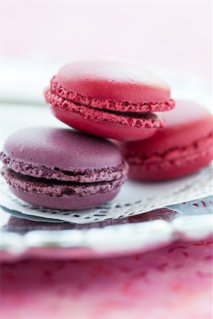 simsearch:400-06564979,k - Closeup of three sweet macaroons on white decorative mat Stock Photo - Budget Royalty-Free & Subscription, Code: 400-06564983