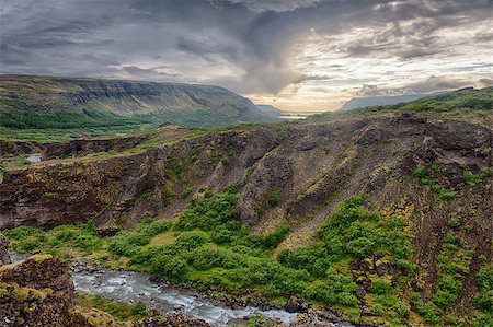 simsearch:400-07756743,k - Canyon leading to Glymur, the highest of the Icelandic waterfalls. It is located on the west of the island. Foto de stock - Super Valor sin royalties y Suscripción, Código: 400-06565800