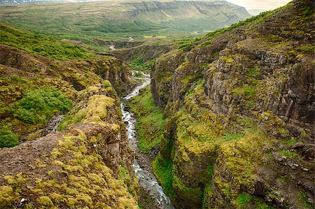 simsearch:400-07756743,k - Canyon leading to Glymur, the highest of the Icelandic waterfalls. It is located on the west of the island. Foto de stock - Super Valor sin royalties y Suscripción, Código: 400-06565801