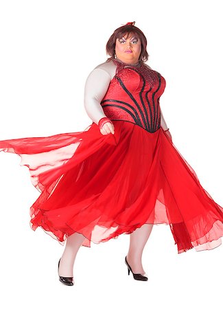 dress for fat women - Cheerful man, Drag Queen, in a Female Suit, over white background Stock Photo - Budget Royalty-Free & Subscription, Code: 400-06566127