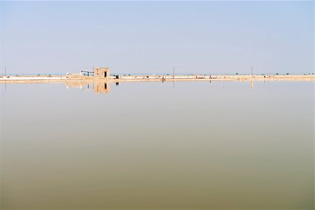 evaporated - Sambhar Salt Lake with striking water colour is the India's largest saline lake, where salt has been farmed for a thousand years. Stock Photo - Budget Royalty-Free & Subscription, Code: 400-06566786