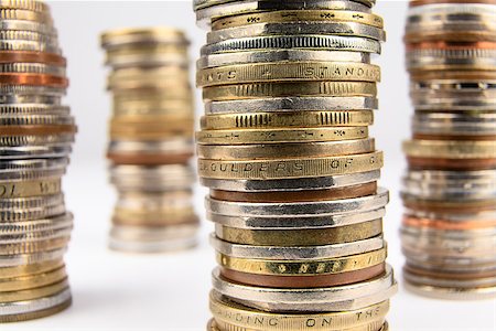 Stack of various coins shown close up. Foto de stock - Royalty-Free Super Valor e Assinatura, Número: 400-06566791