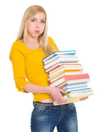 school girl holding pile of books - Tired student girl holding pile of books Stock Photo - Budget Royalty-Free & Subscription, Code: 400-06567078