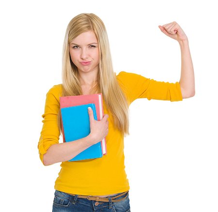 Happy student girl with book showing biceps Stock Photo - Budget Royalty-Free & Subscription, Code: 400-06567082