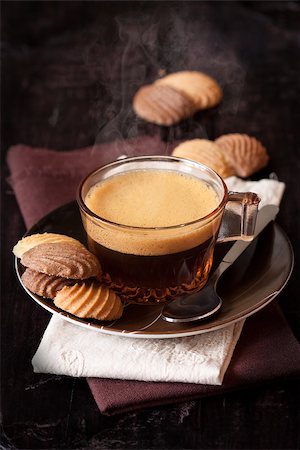 smell chocolate - Cup of coffee and chocolate cookies on a dark wooden background. Stock Photo - Budget Royalty-Free & Subscription, Code: 400-06567258