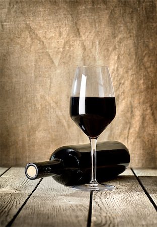 simsearch:400-07316439,k - Black bottle of wine and wneglass on the background of the canvas Stock Photo - Budget Royalty-Free & Subscription, Code: 400-06567387