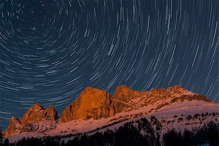 Rosengarten and startrails in a winter evening, Dolomites - Italy Fotografie stock - Microstock e Abbonamento, Codice: 400-06567679