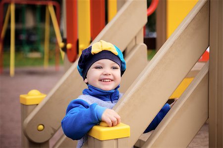 simsearch:400-04707386,k - little boy playing on toy hill at playground Photographie de stock - Aubaine LD & Abonnement, Code: 400-06567680