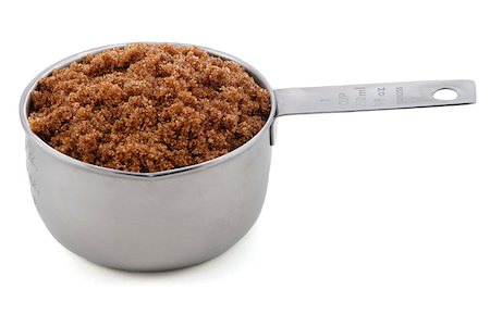 simsearch:400-06791326,k - Dark brown soft / muscovado sugar presented in an American metal cup measure, isolated on a white background Stock Photo - Budget Royalty-Free & Subscription, Code: 400-06568414