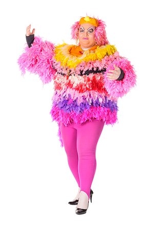 dress for fat women - Cheerful man, Drag Queen, in a Female Suit, over white background Stock Photo - Budget Royalty-Free & Subscription, Code: 400-06568855