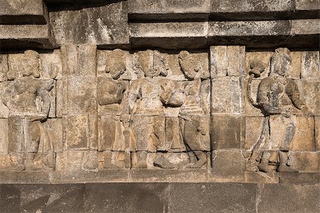 simsearch:400-06558274,k - Detail of Buddhist carved relief at Borobudur temple on Java, Indonesia Photographie de stock - Aubaine LD & Abonnement, Code: 400-06569795