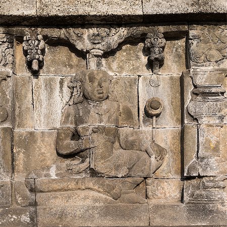 simsearch:400-06558274,k - Detail of Buddhist carved relief at Borobudur temple on Java, Indonesia Photographie de stock - Aubaine LD & Abonnement, Code: 400-06569796