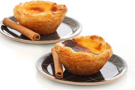 Typical Portuguese custard pies ("Pastel de Nata" or "Pastel de Belem"). Stock Photo - Budget Royalty-Free & Subscription, Code: 400-06560239