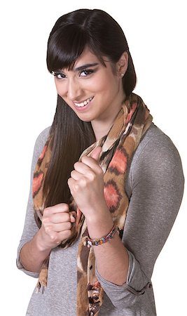 Grinning young woman with fists out on white background Stock Photo - Budget Royalty-Free & Subscription, Code: 400-06561360