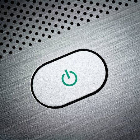 Silver laptop power button close-up Stock Photo - Budget Royalty-Free & Subscription, Code: 400-06561404