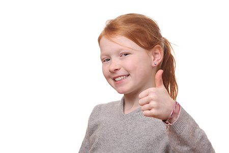 simsearch:400-03952911,k - Portrait of a succesful girl with thumbs up on white background Stock Photo - Budget Royalty-Free & Subscription, Code: 400-06561564