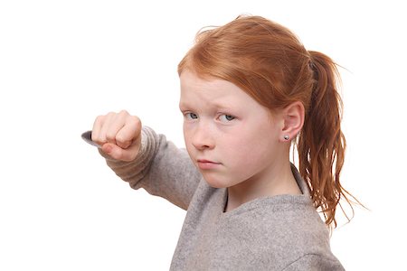 Portrait of an angry young girl on white background Stock Photo - Budget Royalty-Free & Subscription, Code: 400-06561568