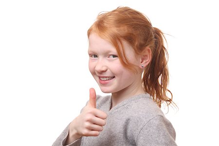 simsearch:400-03952911,k - Portrait of a succesful girl with thumbs up on white background Stock Photo - Budget Royalty-Free & Subscription, Code: 400-06561563