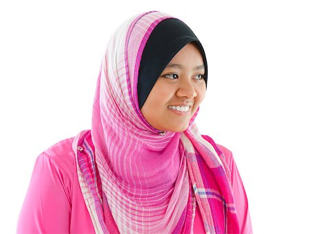 Portrait of Southeast Asian Muslim girl smiling, isolated on white background Stock Photo - Budget Royalty-Free & Subscription, Code: 400-06561704