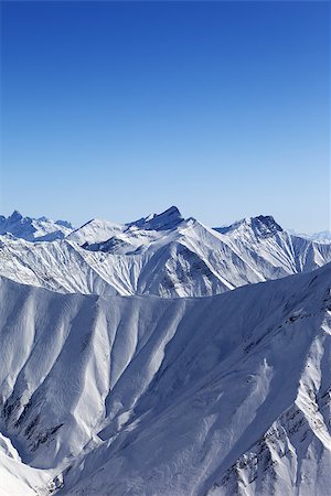 simsearch:400-09170509,k - Winter mountains in nice day. Caucasus Mountains, Georgia, Gudauri. View from ski slope. Photographie de stock - Aubaine LD & Abonnement, Code: 400-06561948