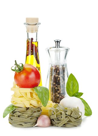 simsearch:400-06796271,k - Italian food: pasta, tomatoes, olive oil, pepper. Isolated on white background Stock Photo - Budget Royalty-Free & Subscription, Code: 400-06562421