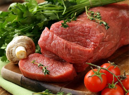 fresh raw beef meat on cutting board Stock Photo - Budget Royalty-Free & Subscription, Code: 400-06562478