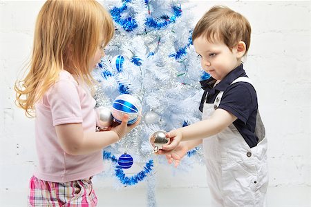 simsearch:400-07088886,k - two beautiful happy children decorate christmas tree Stock Photo - Budget Royalty-Free & Subscription, Code: 400-06562581