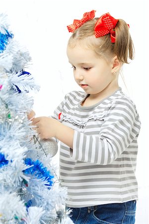 simsearch:400-07088886,k - beautiful happy small girl decorate christmas tree Stock Photo - Budget Royalty-Free & Subscription, Code: 400-06562582